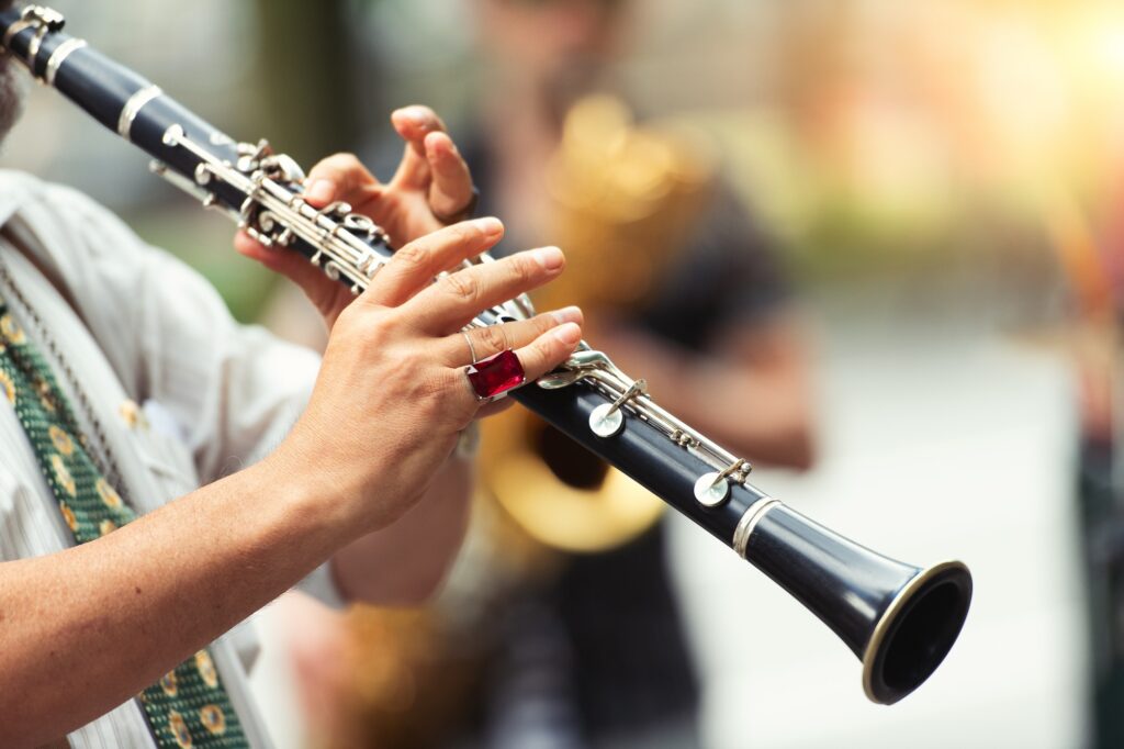 Street musician playing the clarinet